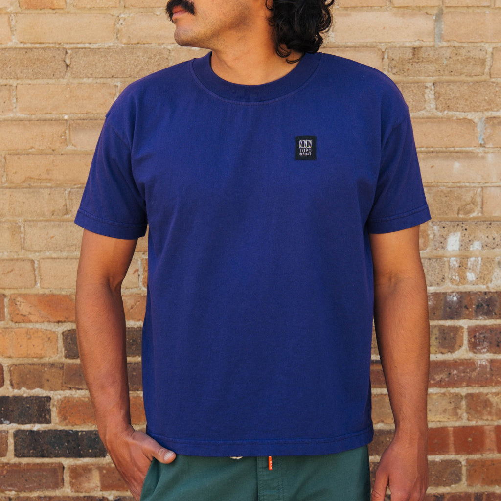 Front lifestyle image of Topo Designs x Soft Goods Label Tee in "Jelly"