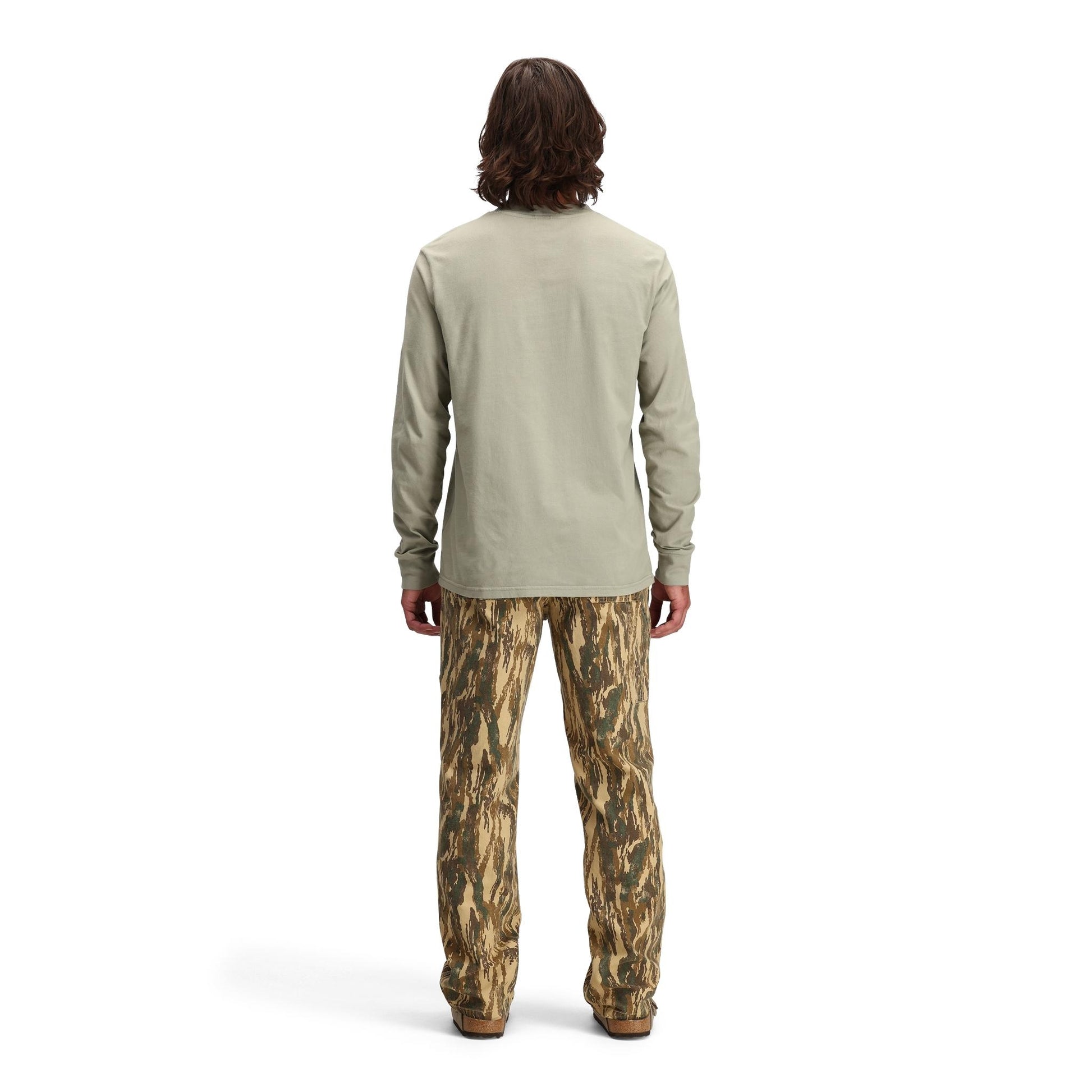 Back model shot of Topo Designs Dirt Pocket Tee Long Sleeve - Men's in "Dried Sage"