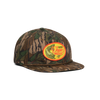 Front quarter shot of Topo Designs x CCH x Pine Printshop Rope Cap in "Mossy Oak Greenleaf"