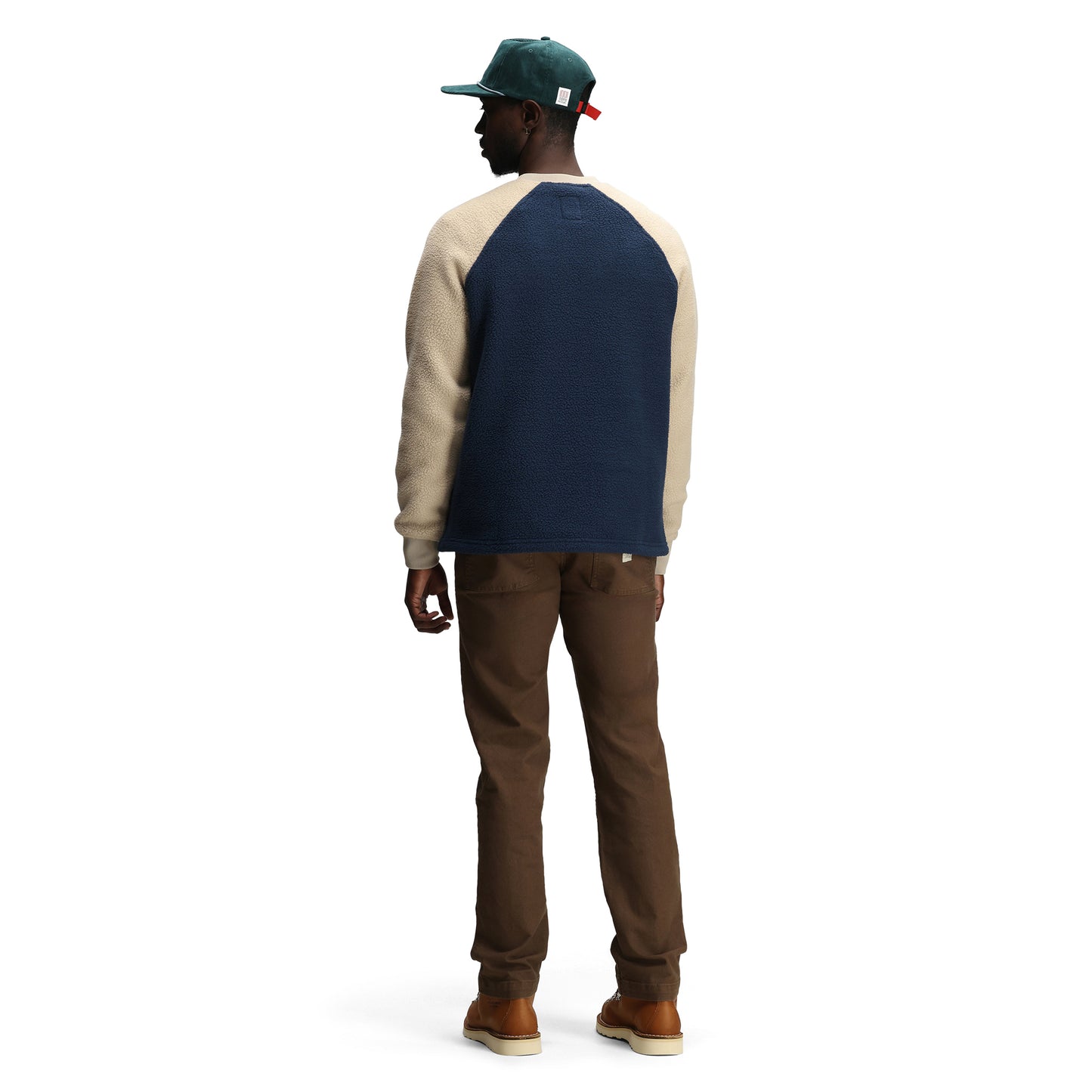 General back model shot of Topo Designs Mountain Fleece Crewneck - Unisex in "Midnight / Oatmeal"
