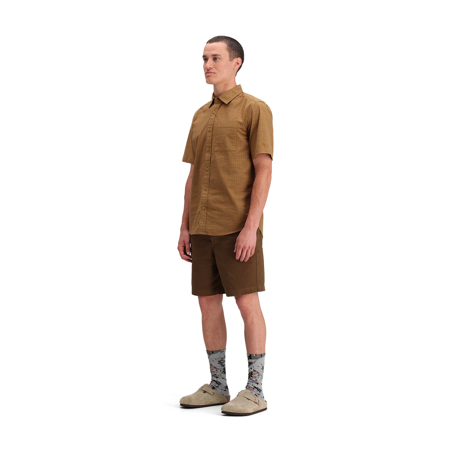 Side model shot of Topo Designs Dirt Desert Shirt Ss - Men's  in "Dark Khaki Terrain"