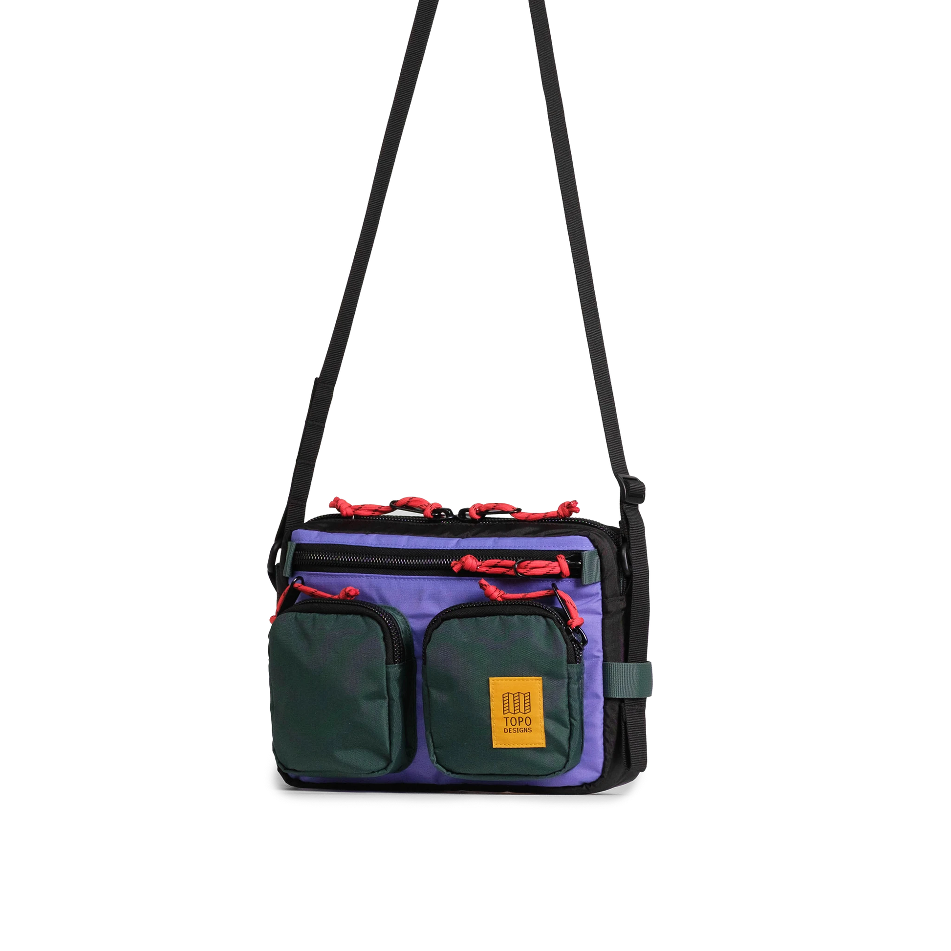 Front quarter view of Topo Designs Block Bag in "Very Peri / Forest"