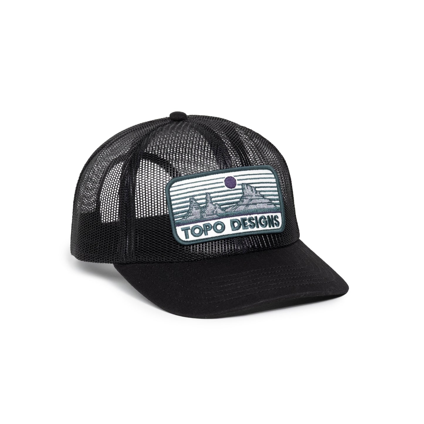 Front white background quarter image of Topo Designs Patch Mesh Trucker - Desert Dusk in "Black"