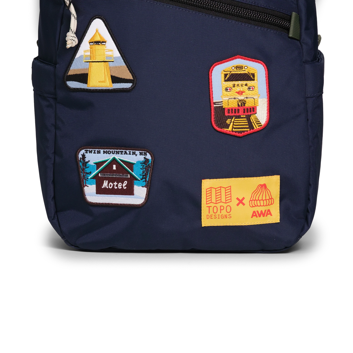 Front exterior detail image of the Topo Designs x AWA Light Pack in "Navy / Navy"