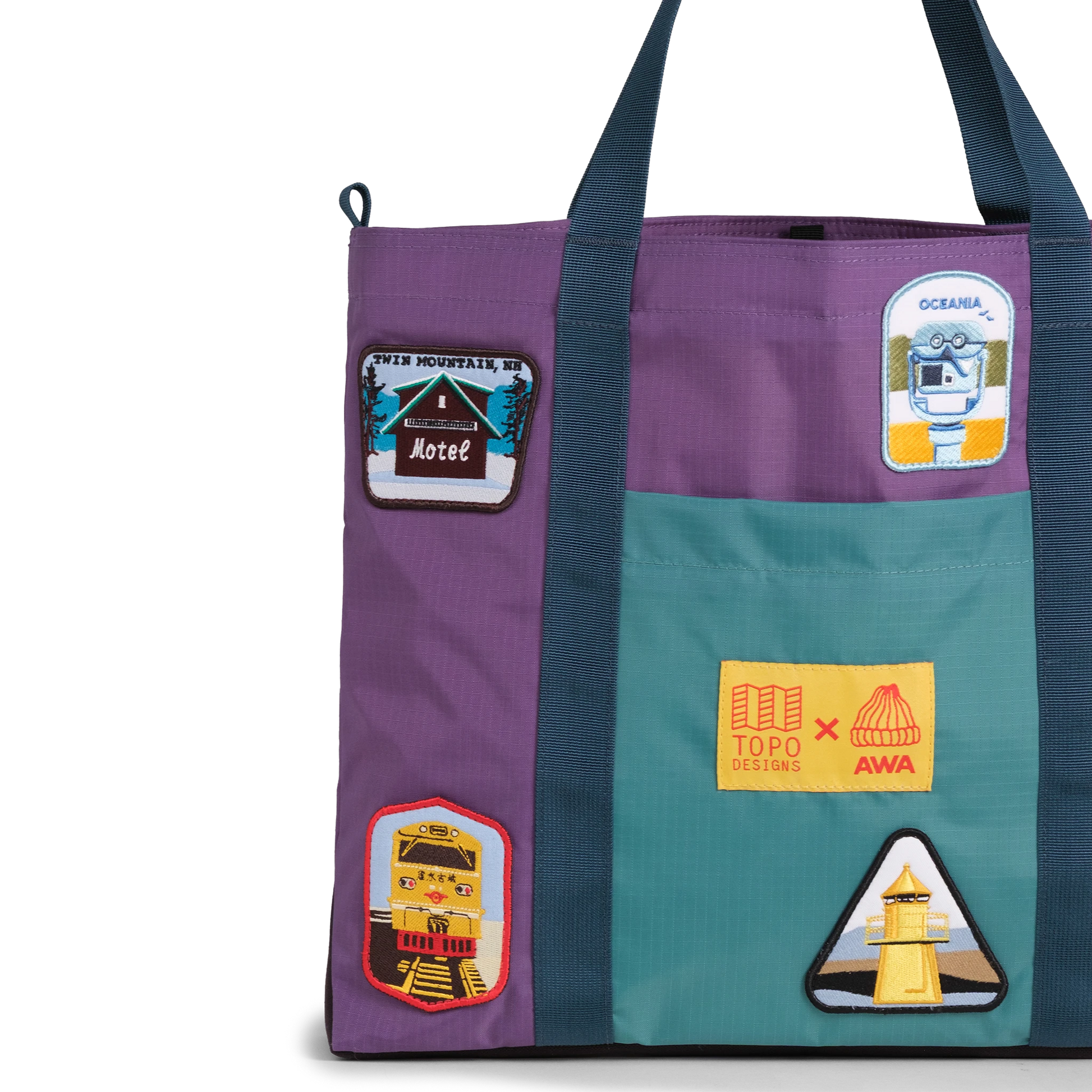 Front exterior detail image of Topo Designs x AWA Mountain Essential Tote in "Loganberry / Caribbean"