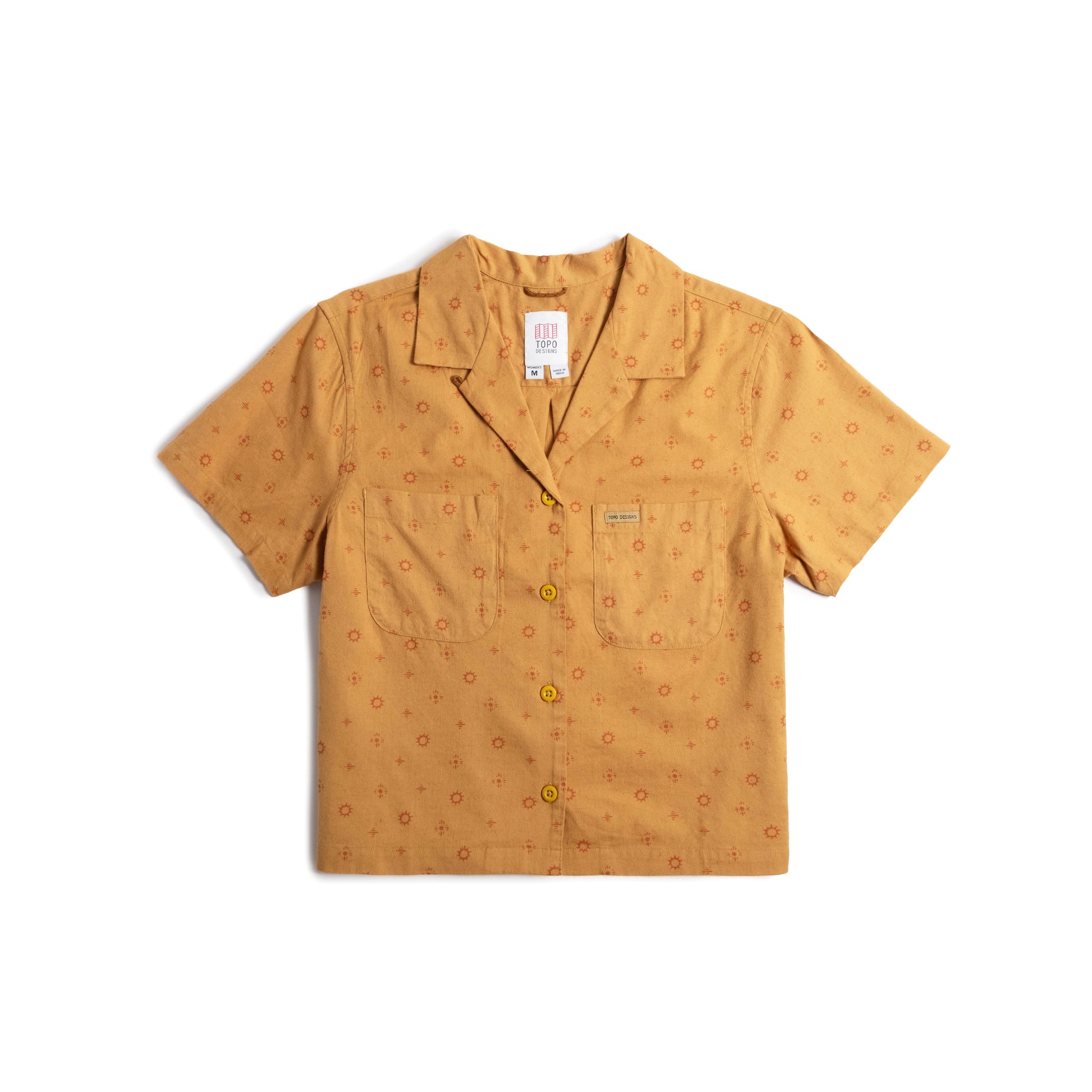 Front flat lay image on white background of Topo Designs Daytripper Short Sleeve Shirt - Women's in "Tossed Motif Goldenrod"