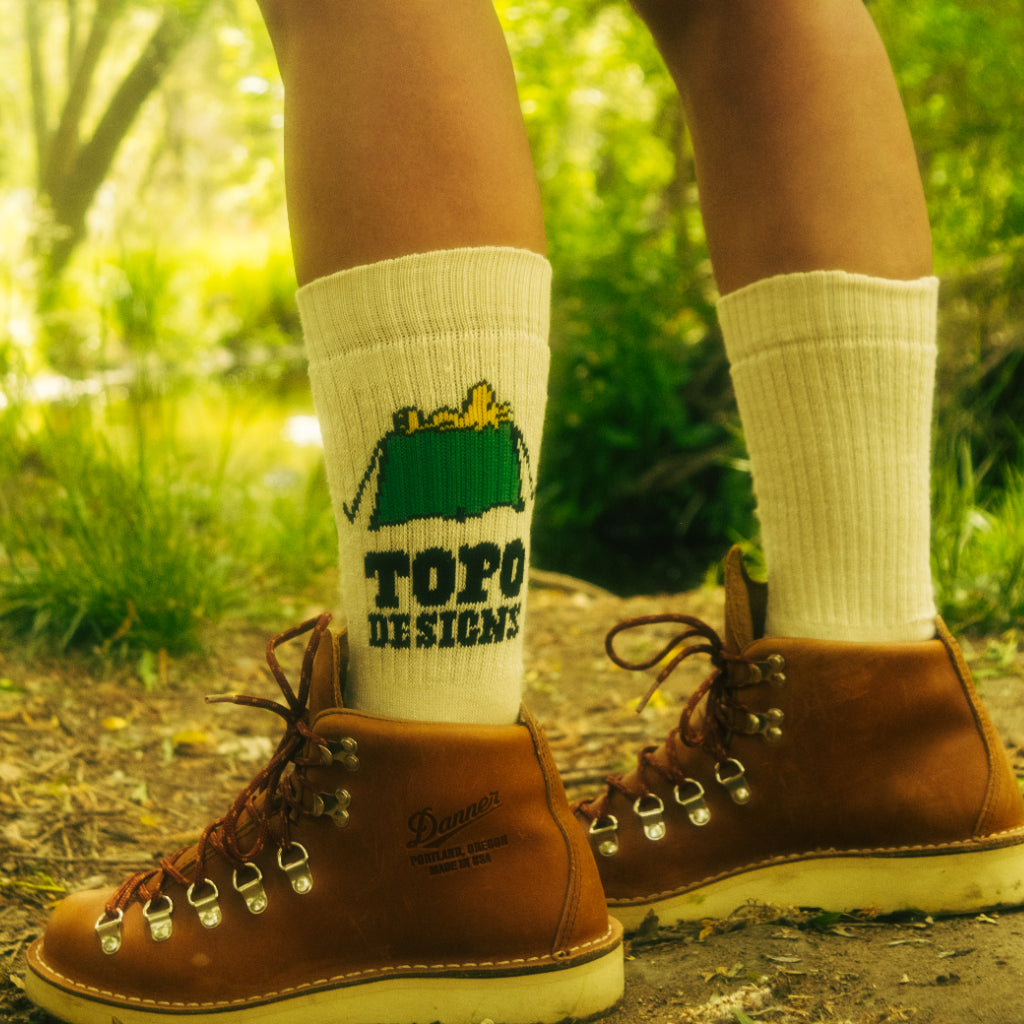 General lifestyle image of Topo Designs x TSPTR Tent Socks in "Ecru"