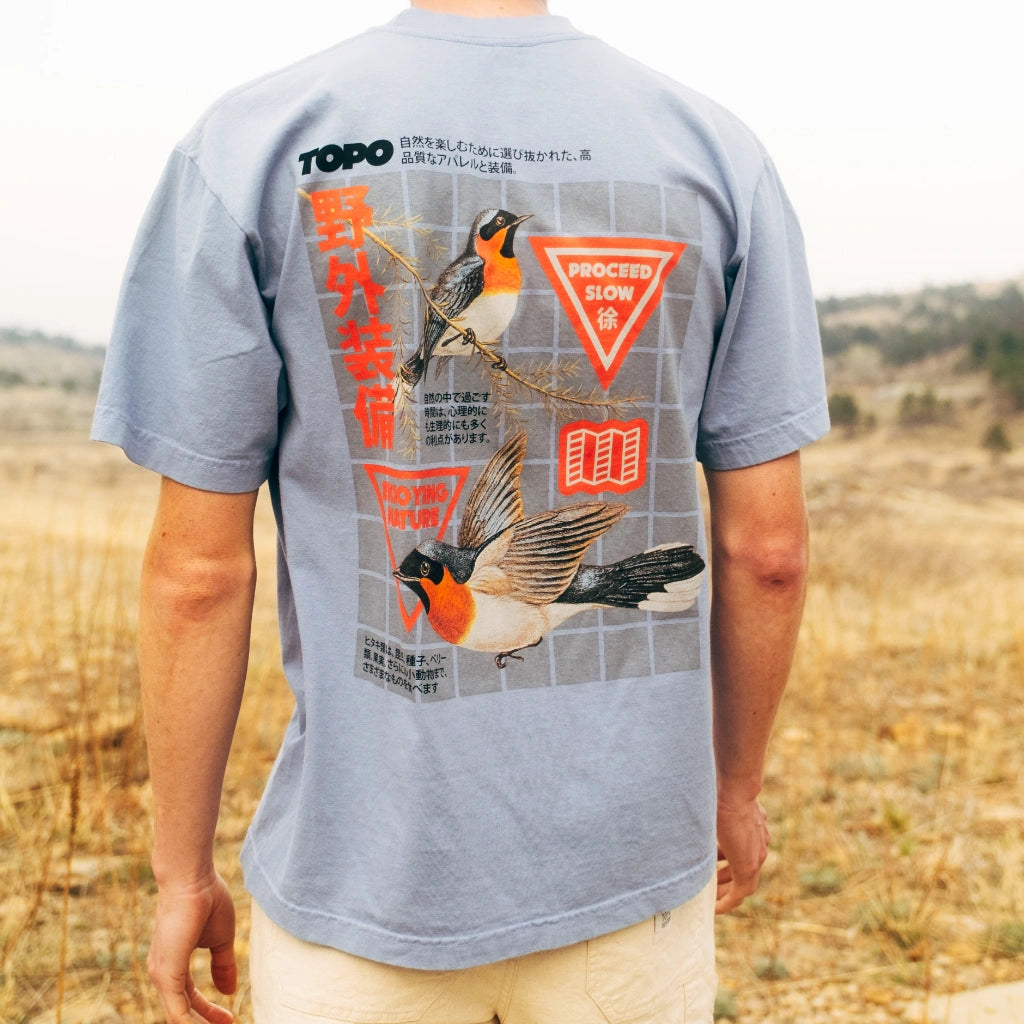 General back image of Topo Designs x Pine Printshop Proceed Slow Tee in "Clear Blue"