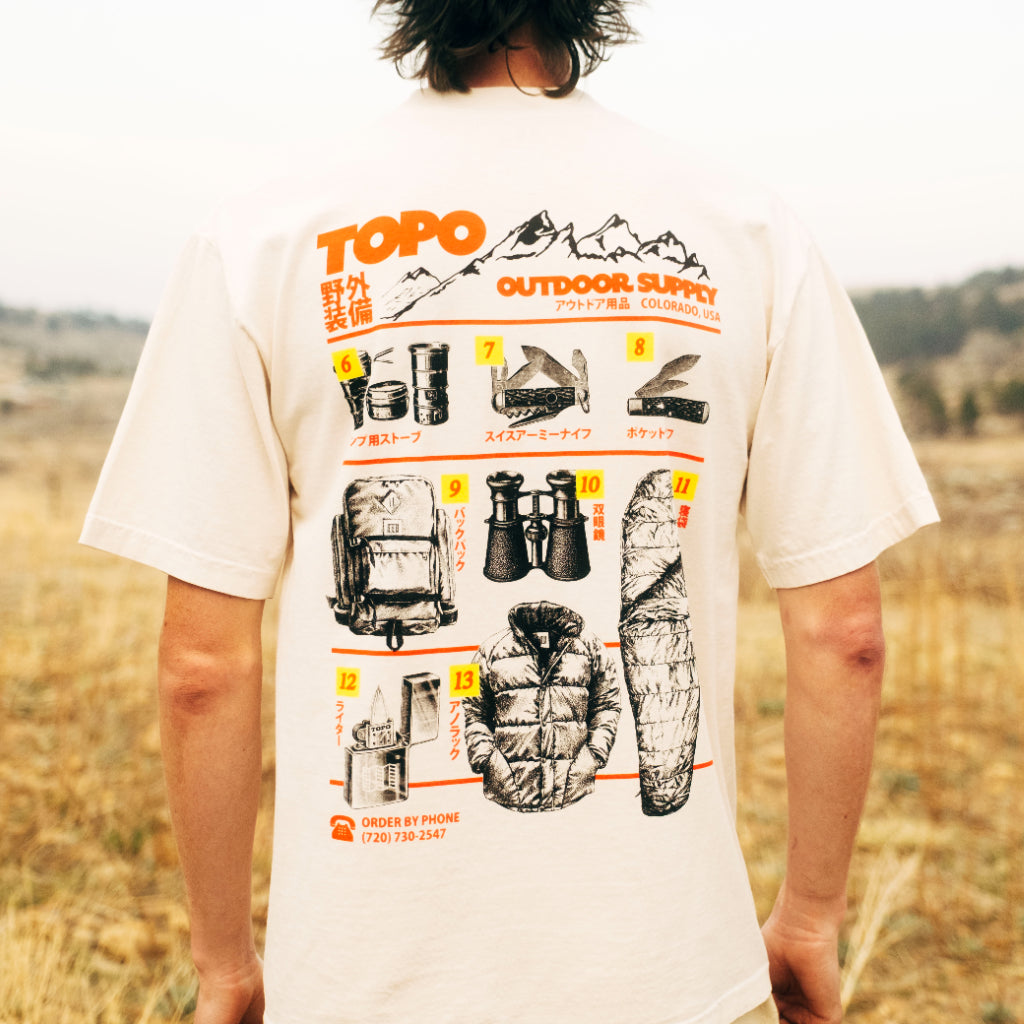 General back model image of Topo Designs x Pine Printshop Catalog Tee in "Creme"